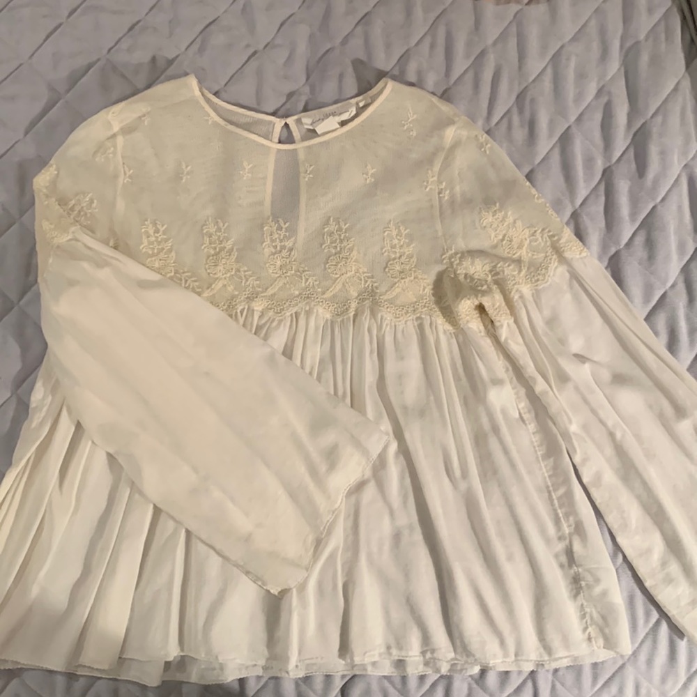 H&M blouse, limited L.O.G.G collection. Size US14-16. Great for mama to be.